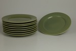 8 tallrikar, grön glasyr, 1900-talets senare del