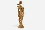 1900-TAL. FIGUR I RESIN, KVINNA MED FÅGLAR.